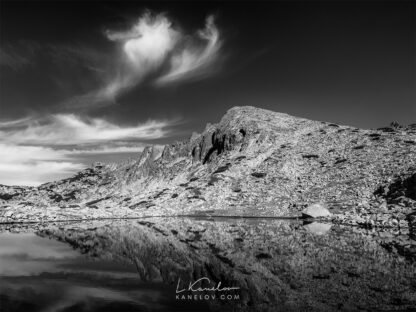 Black and white mountain lake reflection